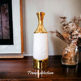 White And Golden Vase