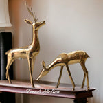 Pair of vintage brass deer sculptures
